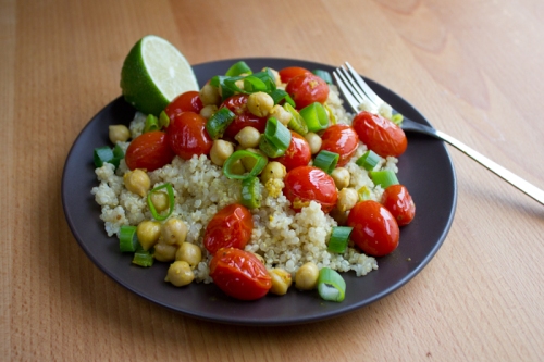 Ginger-curry burst tomatoes with chickpeas over quinoa